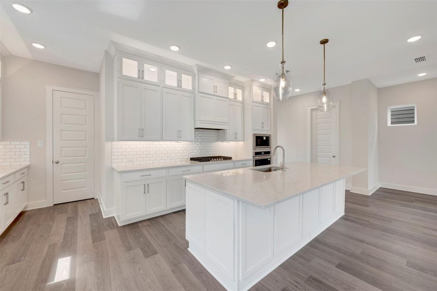 Furnished interior view inside a new home in Elyson 40', Katy (Image 7).