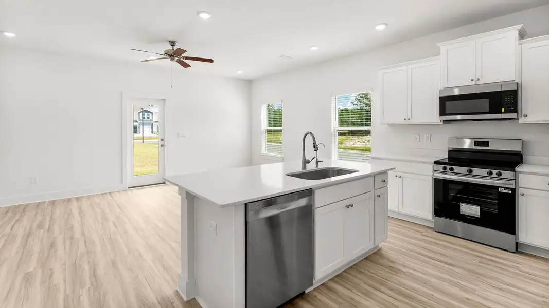 Furnished interior view inside a new home in Hawks Landing Townhomes, Santa Rosa Beach (Image 4).