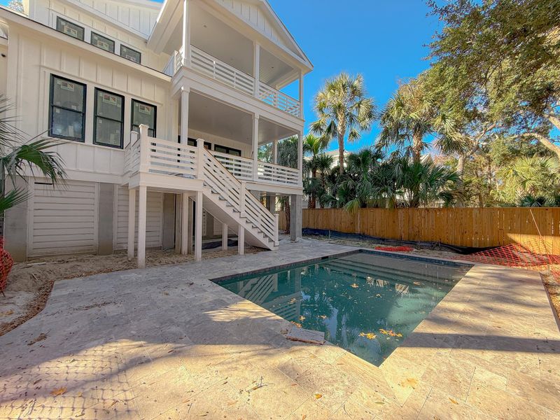 Exterior details and patio area of a home in , Isle Of Palms (Image 11).