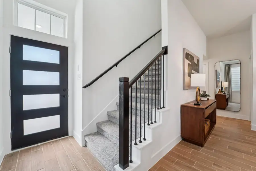 Furnished interior view inside a new home in Bridgeland, Cypress (Image 5).