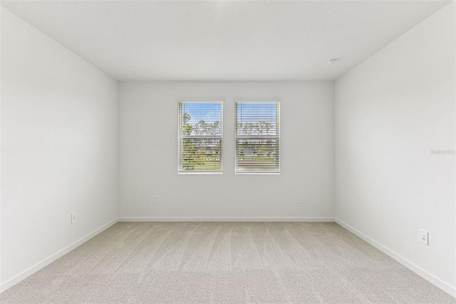 Spacious, unfurnished interior of a new home in Colbert Landings, Palm Coast (Image 14).