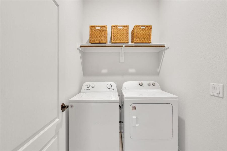 Laundry area with separate washer and dryer