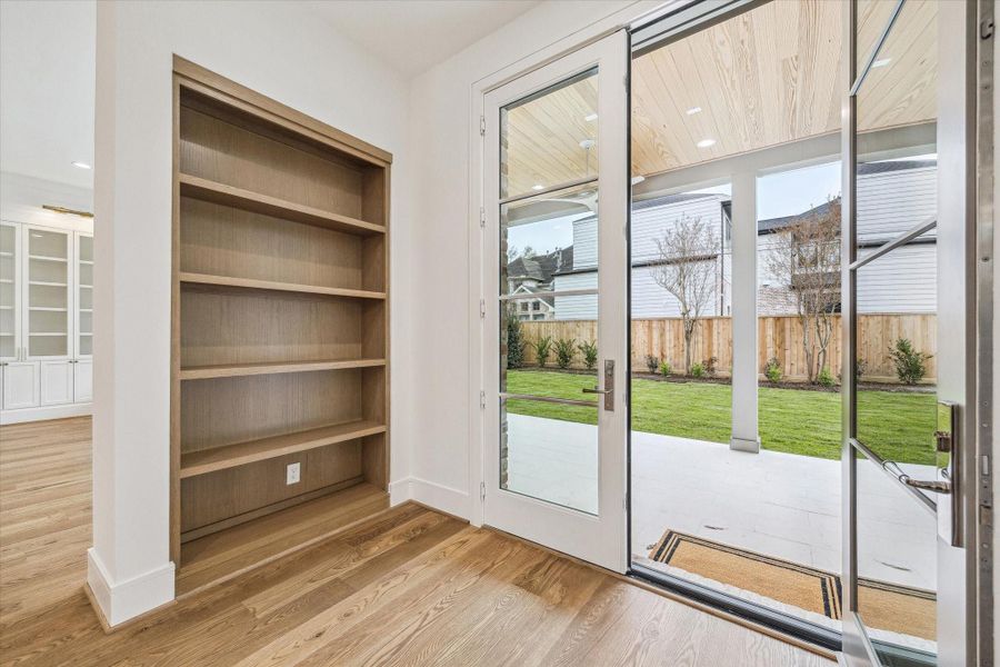 Tucked back Vestibule between double doors to Veranda and Game Room! Custom Built in! Tucked back Vestibule between double doors to Veranda and Game Room! Custom Built in!