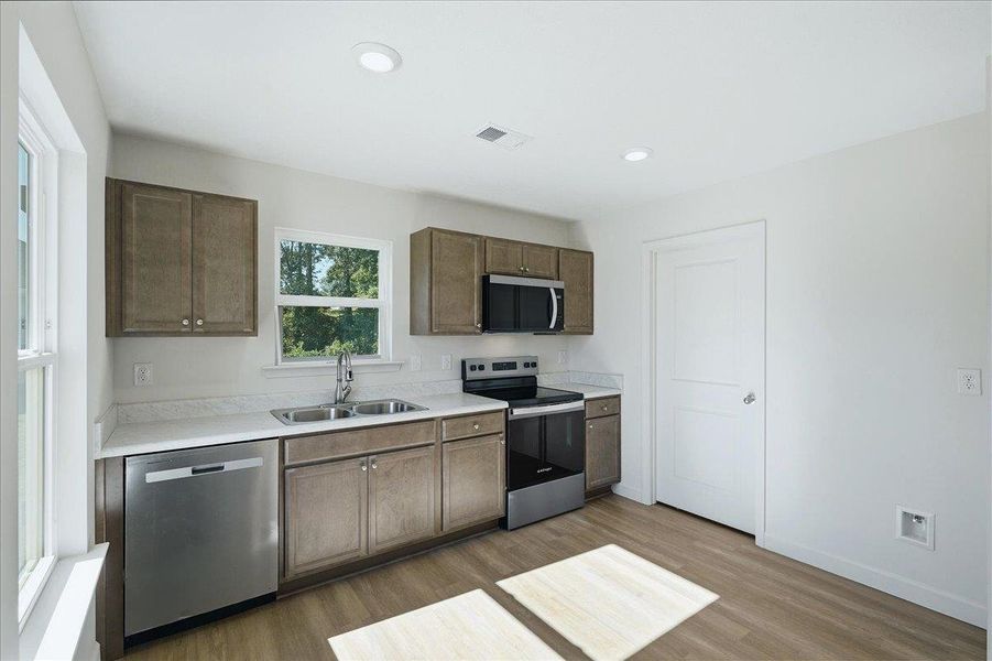 Furnished interior view inside a new home in Stones Throw, Inman (Image 7).