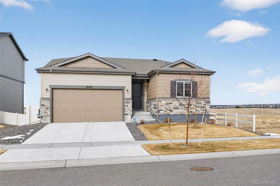 Front exterior of a new home in Anthology North, Parker, CO, highlighting curb appeal (Image 2).