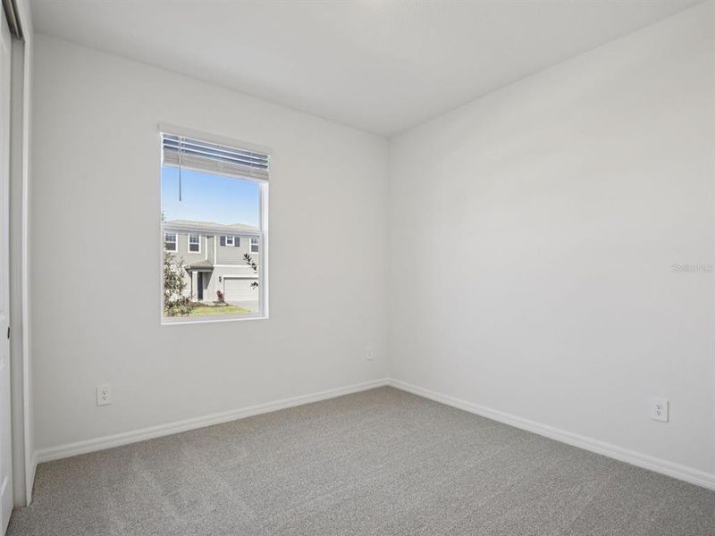 Spacious, unfurnished interior of a new home in Coasterra - Reserve Series, Palmetto (Image 17).