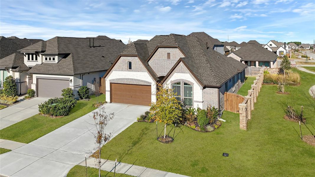 Front exterior of a new home in Edgewater, Webster, TX, highlighting curb appeal (Image 21).