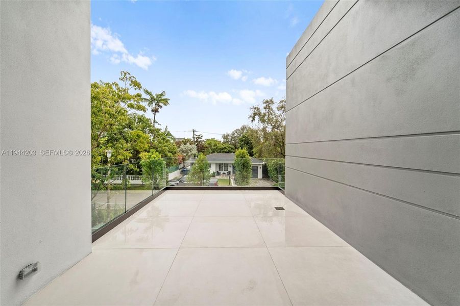 Exterior details and patio area of a home in , Miami (Image 15). Exterior details and patio area of a home in , Miami (Image 15).