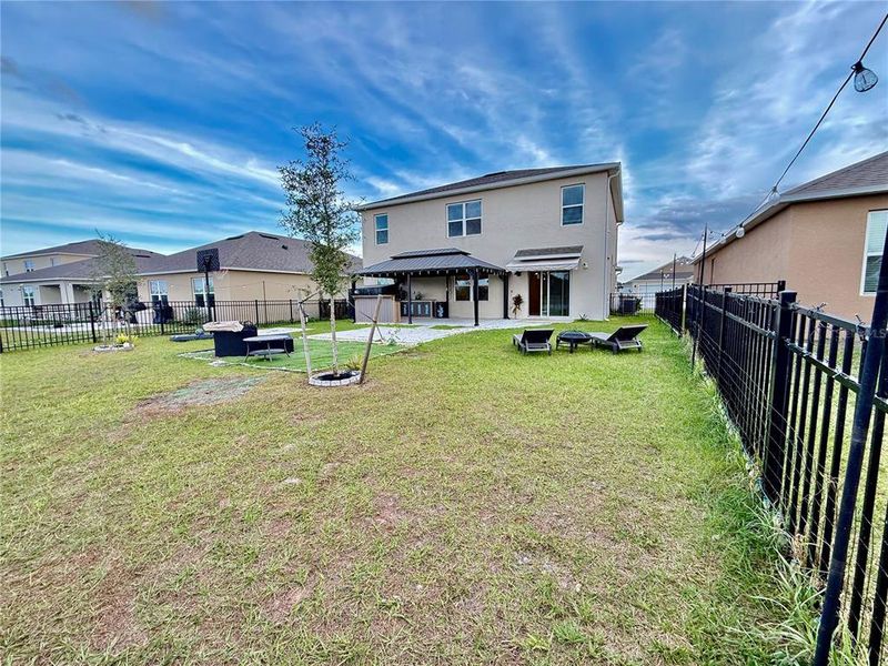 Exterior details and patio area of a home in Harmony West, St. Cloud (Image 33).