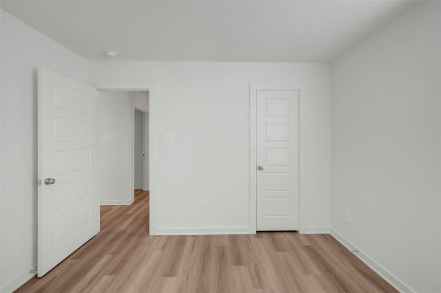 Spacious, unfurnished interior of a new home in Pinewood at Grand Texas, New Caney (Image 20).