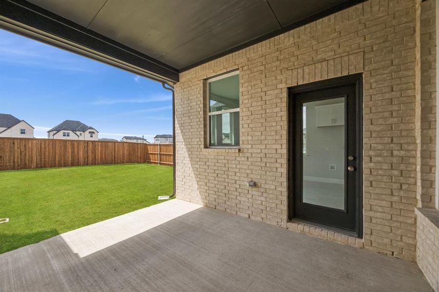 Exterior details and patio area of a home in Bellagio, Forney (Image 2). Exterior details and patio area of a home in Bellagio, Forney (Image 2).