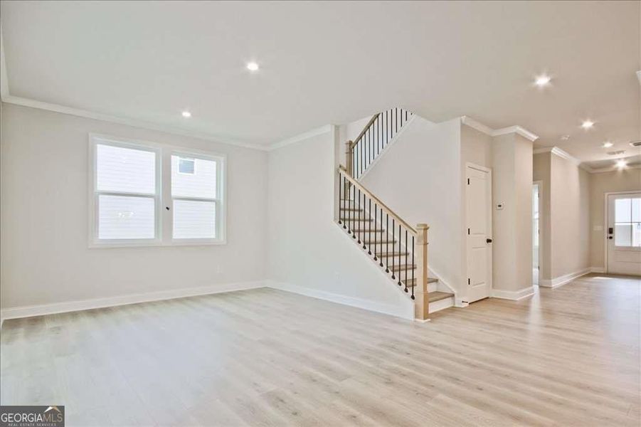 Spacious, unfurnished interior of a new home in The Paddocks at Doc Hughes, Buford (Image 52).