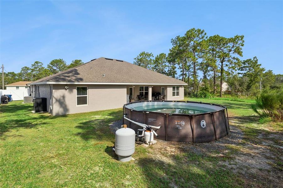 Exterior details and patio area of a home in Royal Highlands, Weeki Wachee (Image 21).
