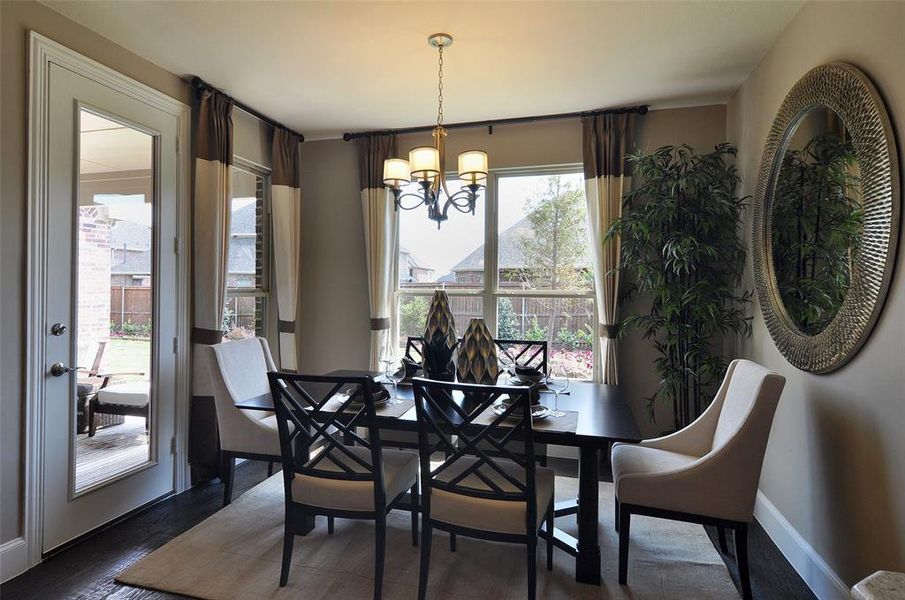 Breakfast nook off kitchen with large windows Breakfast nook off kitchen with large windows