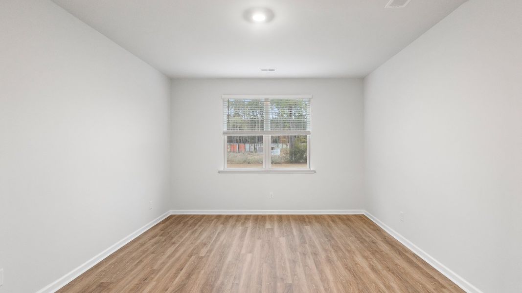 Spacious, unfurnished interior of a new home in Pine Hills at Cane Bay, Summerville (Image 13).