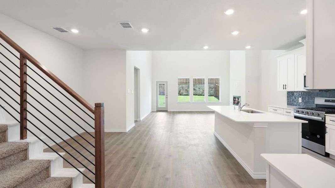 Image 21 representing the Burrow by D.R. Horton in The Landing at Hidden Lakes, McKinney, TX.