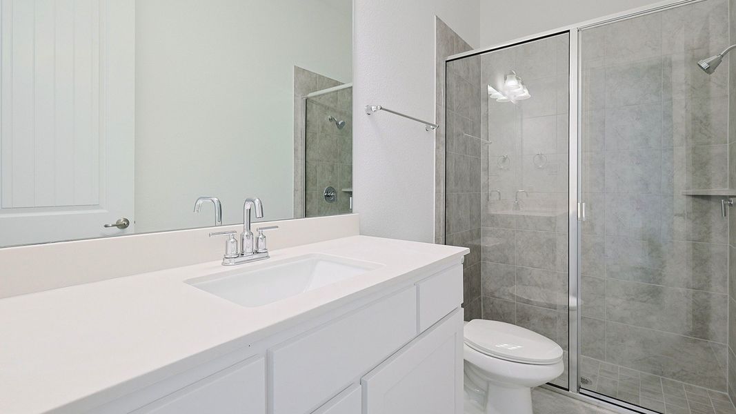 Representative furnished interior of a home built from the Villanova by DRB Homes in Creekhaven, Iowa Colony (Image 15).
