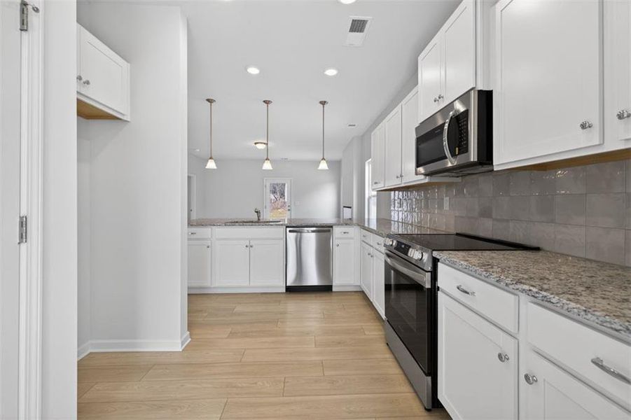 Furnished interior view inside a new home in Allen Manor, Hoschton (Image 4).