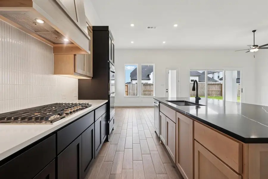 Furnished interior view inside a new home in Sienna 65', Missouri City (Image 6).