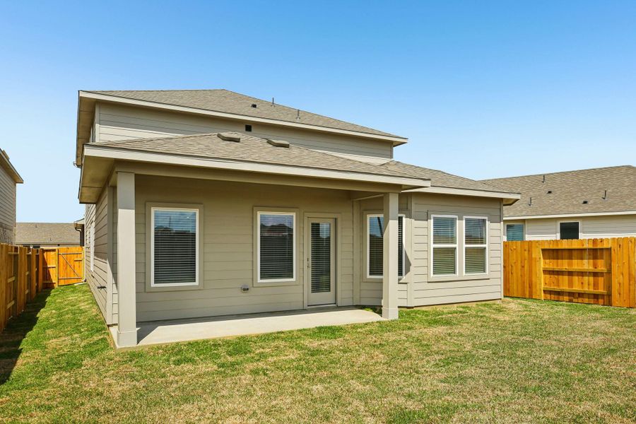 Exterior details and patio area of a home in Sanford Farms - Premier Series, Waller (Image 22).
