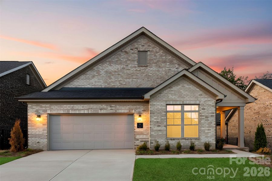 Front exterior of a new home in The Courtyards on New Hope, Gastonia, NC, highlighting curb appeal (Image 2).