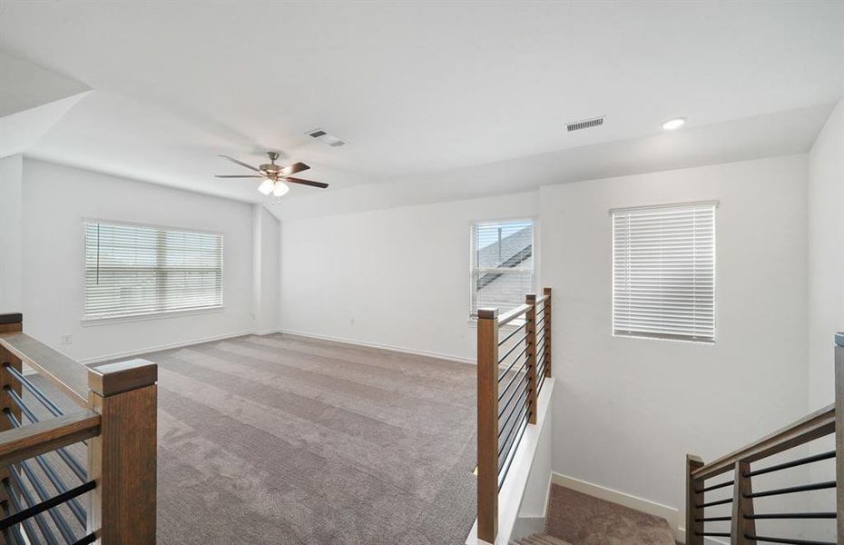 Spacious, unfurnished interior of a new home in Sunterra, Katy (Image 13).