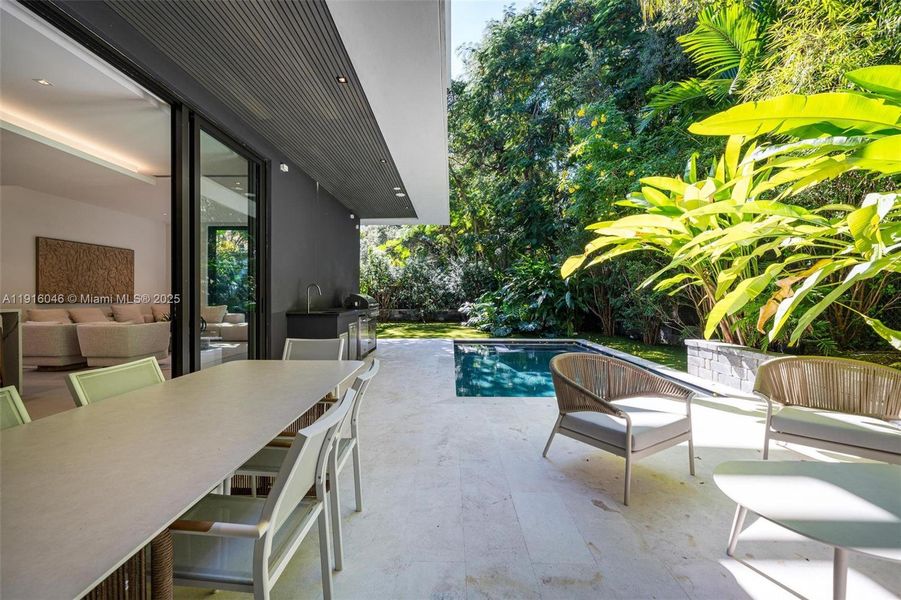 Exterior details and patio area of a home in , Miami (Image 2). Exterior details and patio area of a home in , Miami (Image 2).