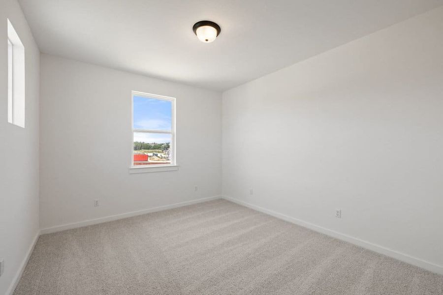 Spacious, unfurnished interior of a new home in Lariat, Liberty Hill (Image 48).