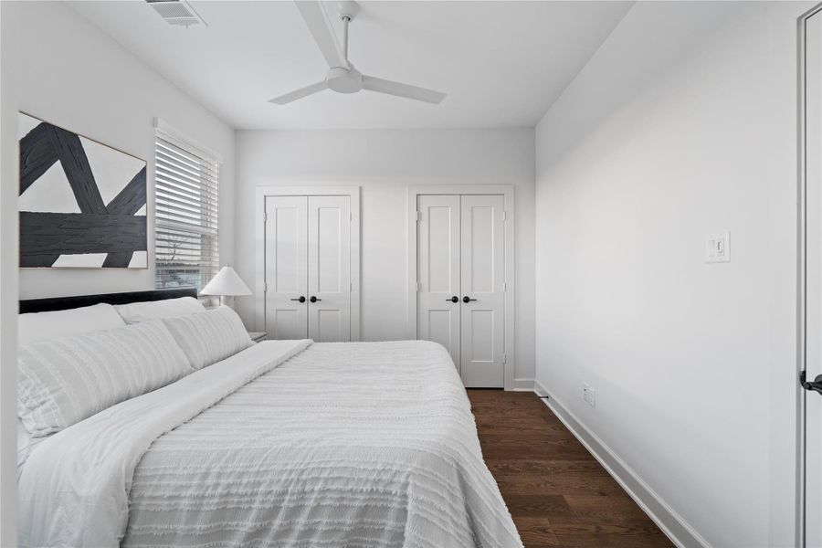 Another angle that showcases the full length of the room, giving you a better sense of how easily it can adapt to different furniture setups, from a guest room layout to a more personalized arrangement.