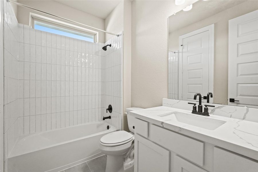 Furnished interior view inside a new home in Waterstone on Lake Conroe, Montgomery (Image 12).