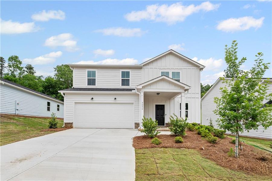 Front exterior of a new home in Avery Ridge, Gainesville, GA, highlighting curb appeal (Image 1).