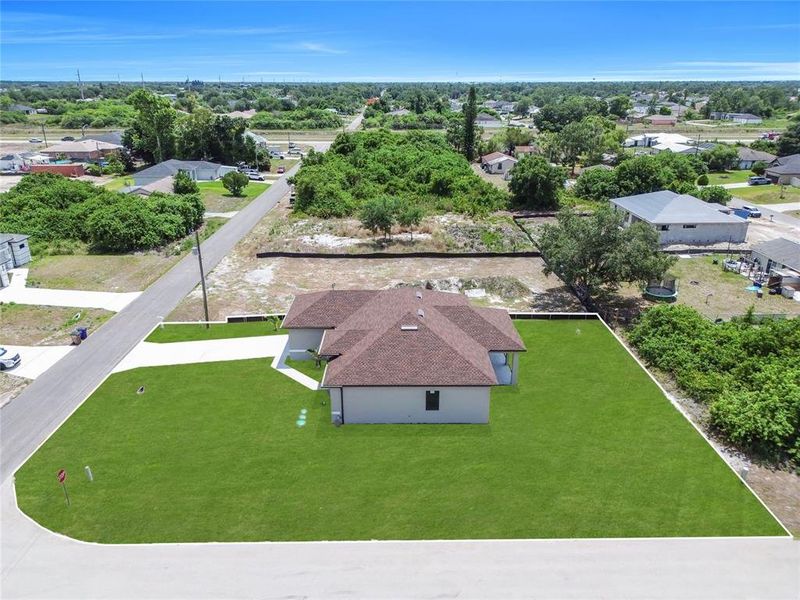 Front exterior of a new home in , Lehigh Acres, FL, highlighting curb appeal (Image 24).