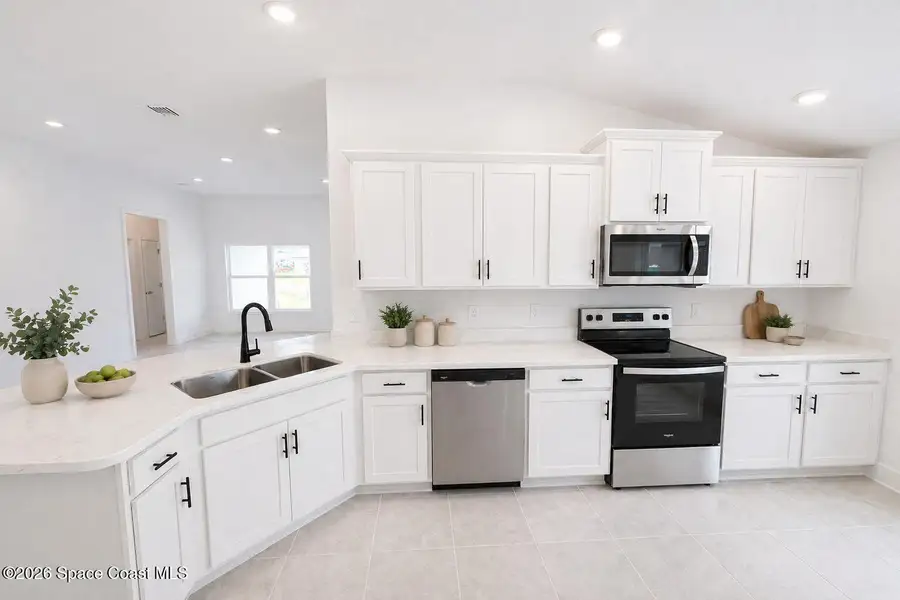 Furnished interior view inside a new home in St. John's Preserve, Palm Bay (Image 4).