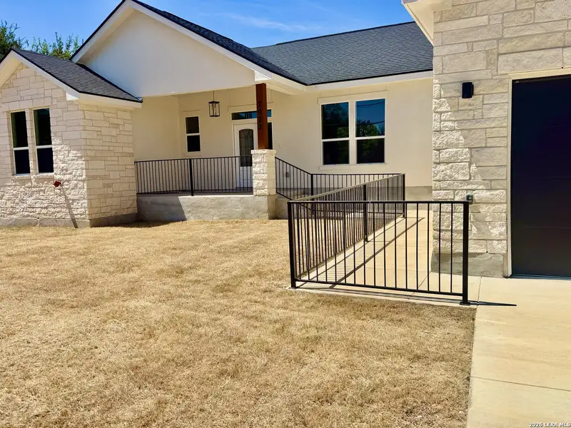 Exterior details and patio area of a home in , Bulverde (Image 4).