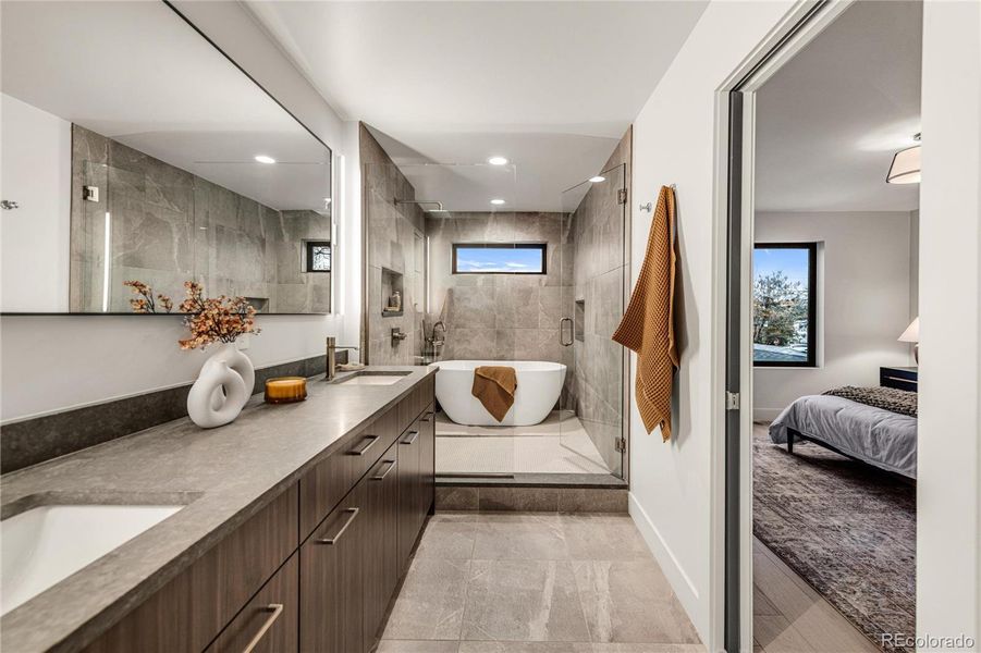 Euro-inspired, luxury wet room in the ensuite Primary Bathroom.