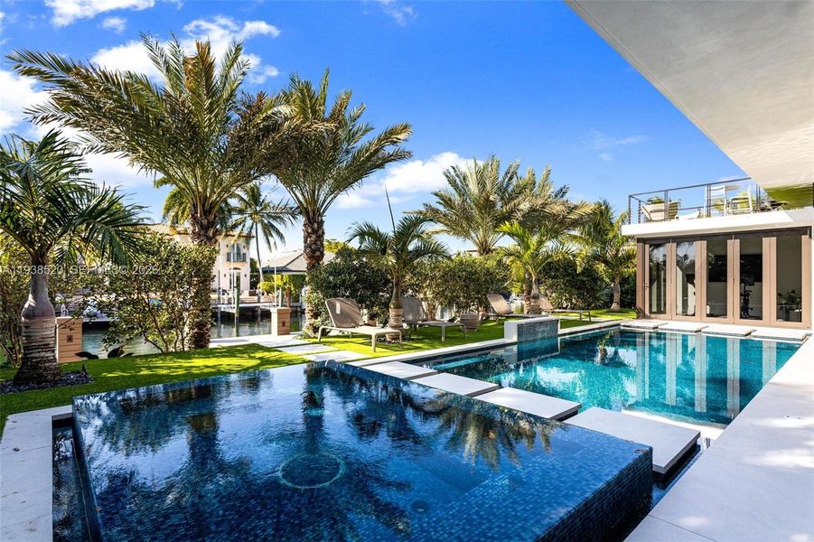 Exterior details and patio area of a home in , North Miami (Image 27).