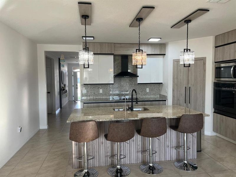 Furnished interior view inside a new home in Kindred, Kissimmee (Image 5).