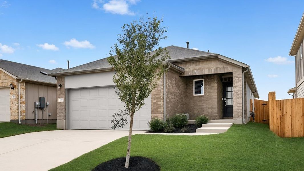 Representative exterior photo of a completed home built from the Falcon by Taylor Morrison in Sunfield, Mustang Ridge, TX (Image 11).