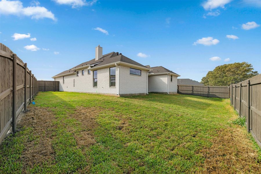 Exterior details and patio area of a home in , Bryan (Image 20). Exterior details and patio area of a home in , Bryan (Image 20).