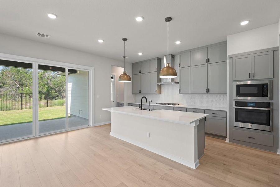 Furnished interior view inside a new home in Capitol Collection at Lariat, Liberty Hill (Image 6). Furnished interior view inside a new home in Capitol Collection at Lariat, Liberty Hill (Image 6).