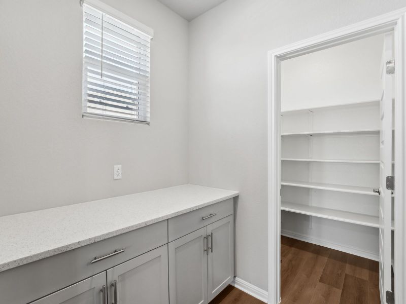 Furnished interior view inside a new home in Big Sky Ranch - Executive Collection, Dripping Springs (Image 4).