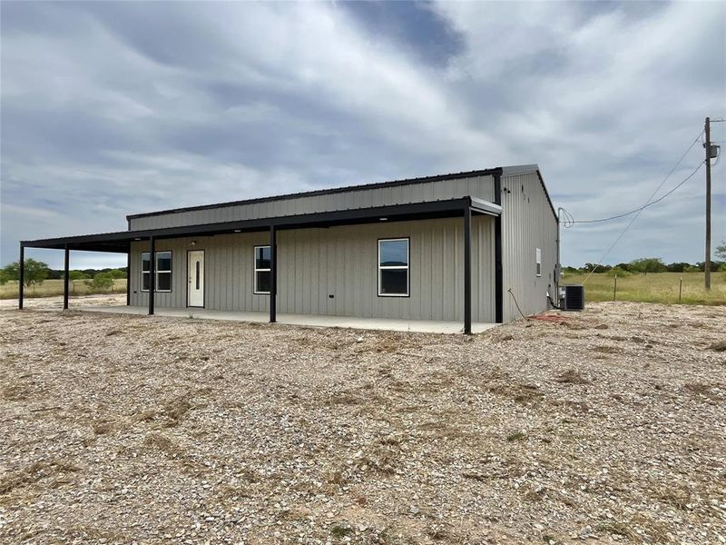 Exterior details and patio area of a home in , Mineral Wells (Image 19).