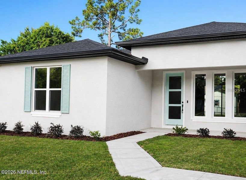 Exterior details and patio area of a home in , Palm Coast (Image 2). Exterior details and patio area of a home in , Palm Coast (Image 2).