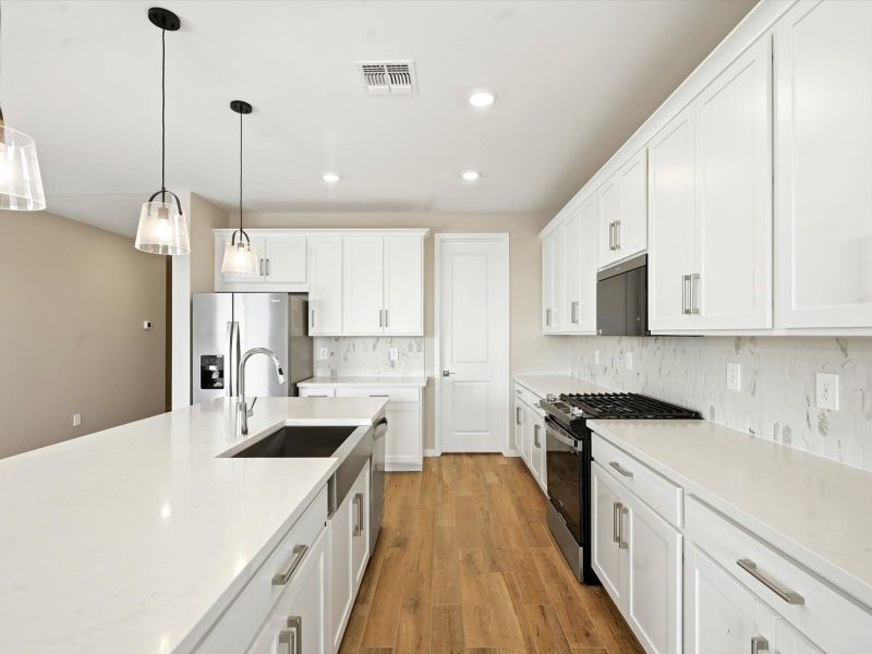 Furnished interior view inside a new home in White Tank Foothills Reserve Series, Waddell (Image 4).