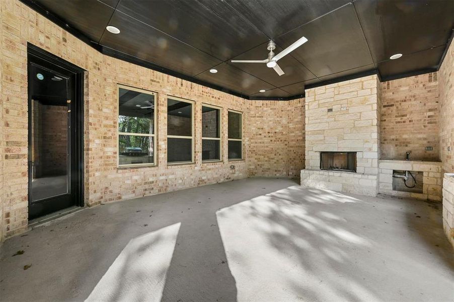 View of patio featuring ceiling fan