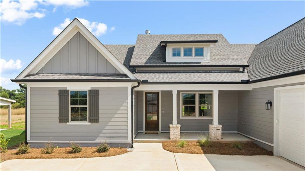Front exterior of a new home in , Madison, GA, highlighting curb appeal (Image 29). Front exterior of a new home in , Madison, GA, highlighting curb appeal (Image 29).