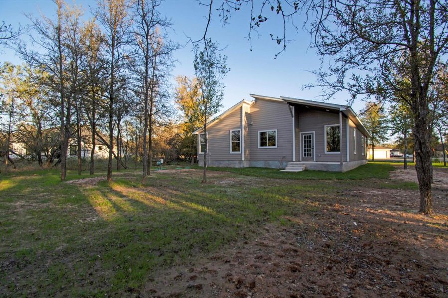 Exterior details and patio area of a home in , Bastrop (Image 24).