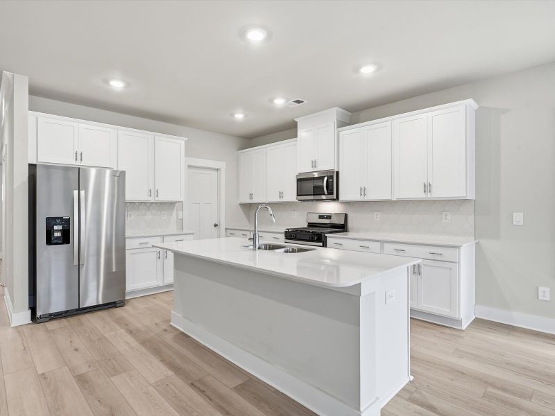 Furnished interior view inside a new home in Crossing at Abner Creek, Greer (Image 3).