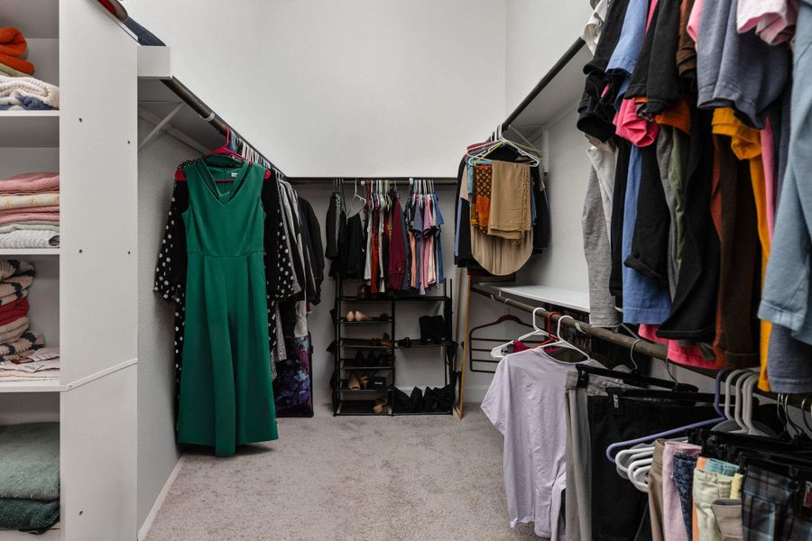 Walk-in-closet found in primary suite