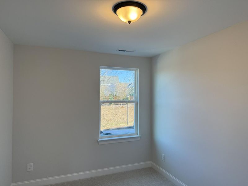 Spacious, unfurnished interior of a new home in Enclave at Traditions Townhomes, Wake Forest (Image 16).